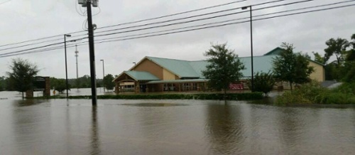 Outside view of Steubner Airlines Veterinary Hospital after hurricane flooding
