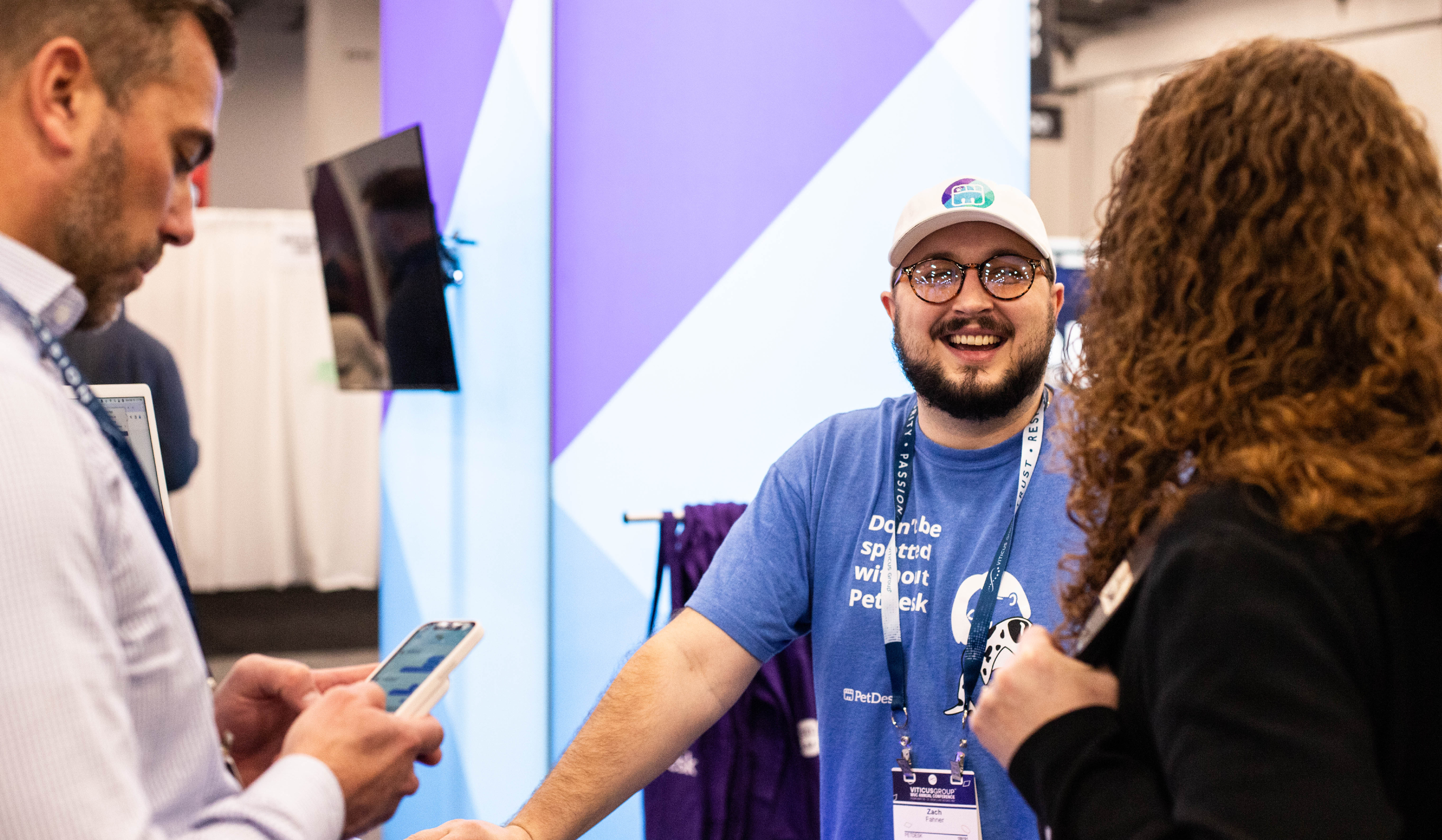 PetDesk Account Executive smiling while giving a prospective client a demo